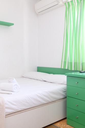 Postel nebo postele na pokoji v ubytování Platja Puig