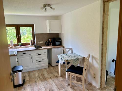 Kuchyň nebo kuchyňský kout v ubytování Pumphut's Scheune Ferienwohnungen Nr 5 - 9 Nähe Freizeitpark Plohn