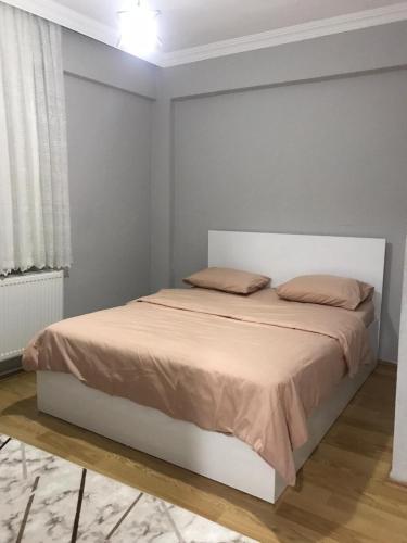 Ένα ή περισσότερα κρεβάτια σε δωμάτιο στο Rova konaklama