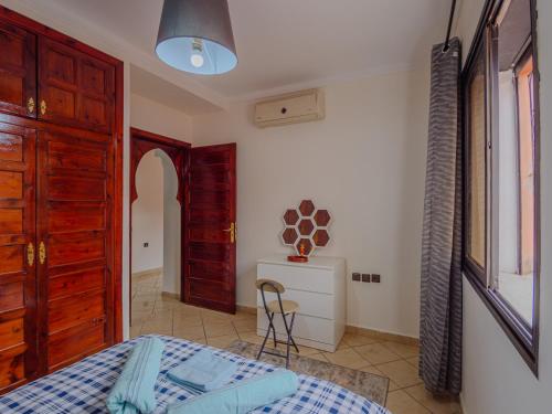 Postel nebo postele na pokoji v ubytování Family Illuminated Apartment With Pool