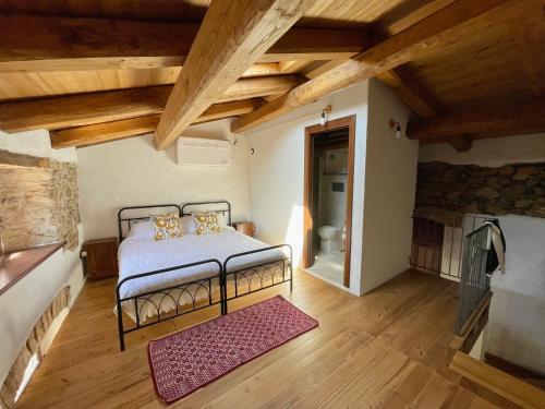 Postel nebo postele na pokoji v ubytování Casa Asproni