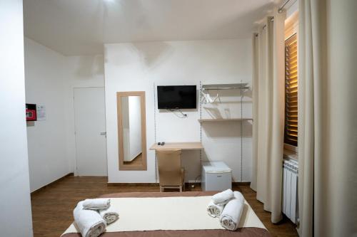 TV a/nebo společenská místnost v ubytování B&B Villa Achibea
