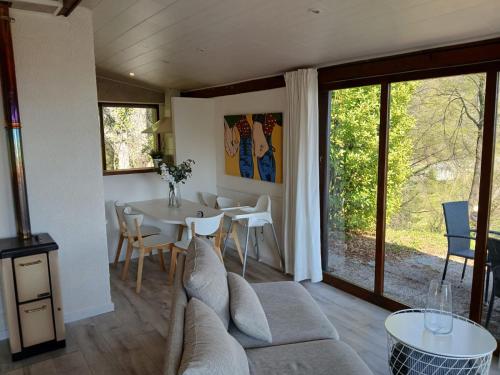 a living room with a couch and a table at La Bella Garda in Tignale