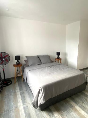 Ένα ή περισσότερα κρεβάτια σε δωμάτιο στο Residence Mana