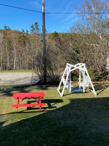 Ein Kinderspielbereich in der Unterkunft Auberge Maison Gauthier