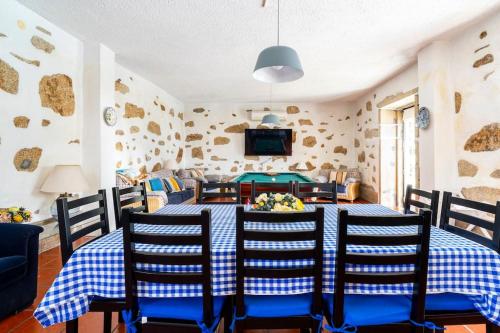 a dining room with a table and chairs at Our Lady of Mercy Villa in Ermesinde