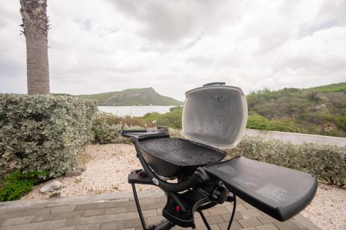 a motorcycle with a tv on the back of it at Piscadera Harbour Village in Willemstad