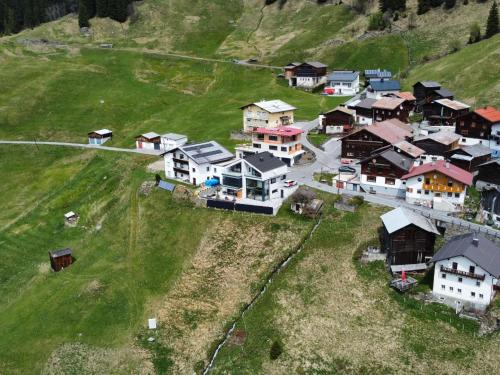 an aerial view of a village with houses on a hill at Holiday Home Skyline Retreat by Interhome in See
