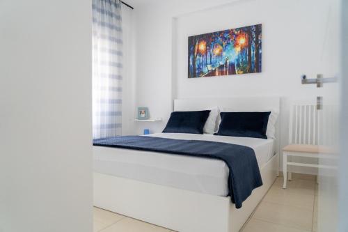 Ένα ή περισσότερα κρεβάτια σε δωμάτιο στο Aja's Apartment