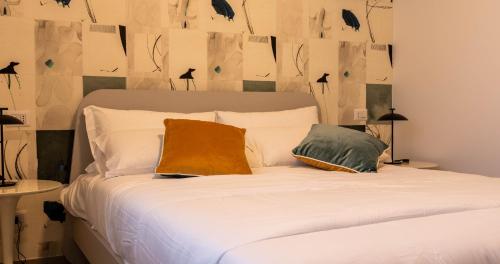 Postel nebo postele na pokoji v ubytování Firrao Rooms Matera