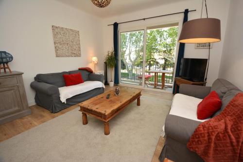 Posezení v ubytování Appartement Tarascon avec garage privé