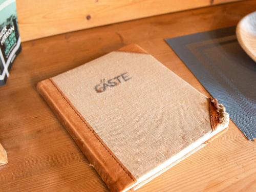 a journal sitting on top of a wooden table at Holiday Home Itzendorfer Rott-2 by Interhome in Norddeich
