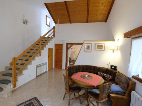 a living room with a couch and a table at Holiday Home Reny by Interhome in L'Ampolla
