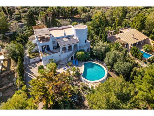 an aerial view of a house with a swimming pool at Villa Pinomar by Interhome in Colonia de Sant Pere