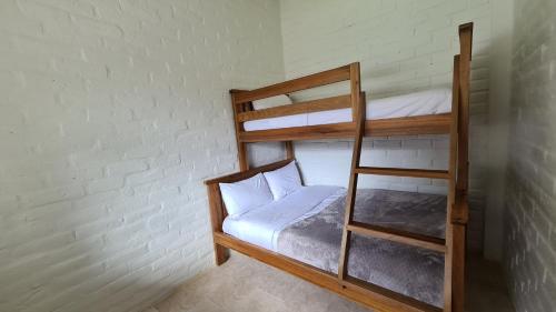 Giường trong phòng chung tại Cabin2 with Volcan View