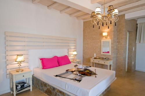 Ένα ή περισσότερα κρεβάτια σε δωμάτιο στο Pearl Suite