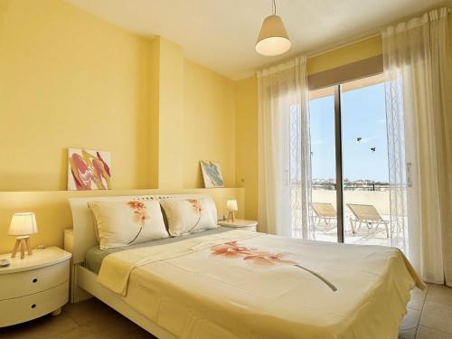 EDEN Apartment tesisinde bir odada yatak veya yataklar