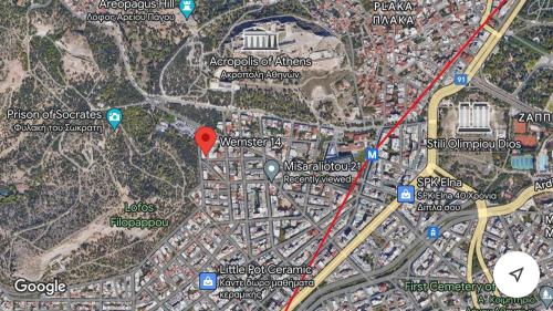 una mappa dell’autostrada con un marcatore rosso di The Acropolis Cave Apartment ad Atene