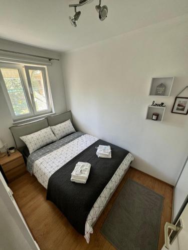 Ένα ή περισσότερα κρεβάτια σε δωμάτιο στο Castelli Apartment Umag