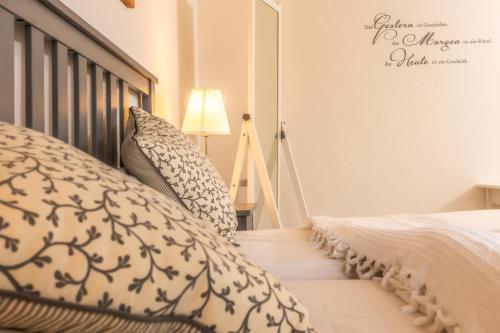 Ένα ή περισσότερα κρεβάτια σε δωμάτιο στο Baltic Appartement