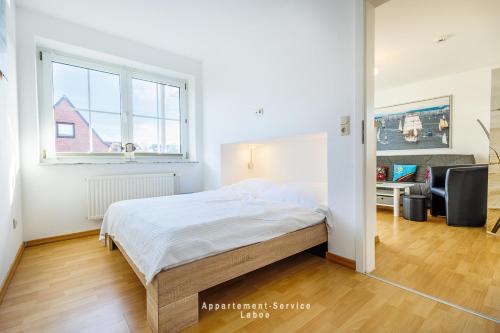 Ένα ή περισσότερα κρεβάτια σε δωμάτιο στο Bellevue W06