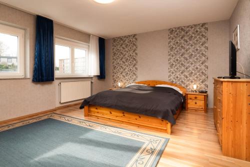 Llit o llits en una habitació de Ferienhaus Störtebeker