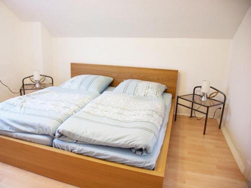 Ein Bett oder Betten in einem Zimmer der Unterkunft Ferienhaus Kassiopeia