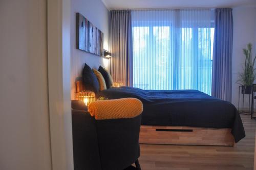 Ένα ή περισσότερα κρεβάτια σε δωμάτιο στο Strandhotel 1