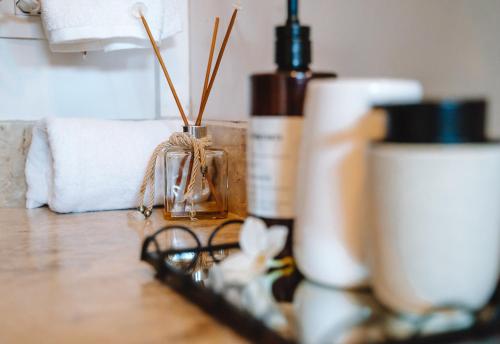 a counter top with towels and other items on it at Hotel Pousada Rancho das Dunas in Santo Amaro
