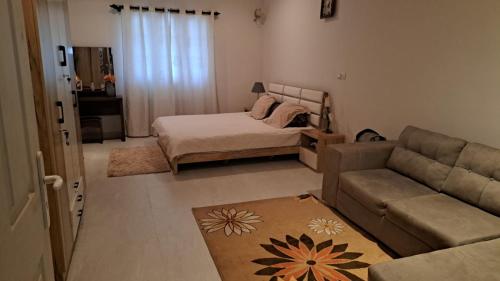 Katil atau katil-katil dalam bilik di Villa calme