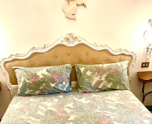 Ένα ή περισσότερα κρεβάτια σε δωμάτιο στο Le Stanze degli Este