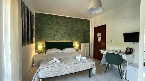 Tempat tidur dalam kamar di Agriturismo Colle Maiano