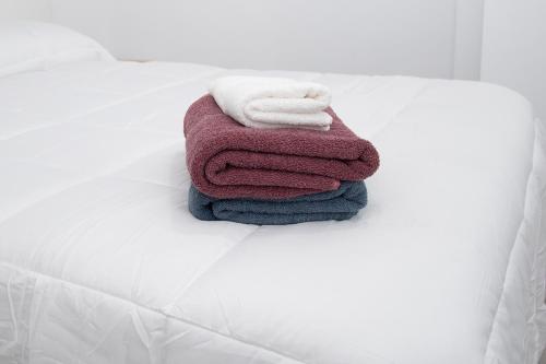 Giường trong phòng chung tại Apartamentos Sanlucar