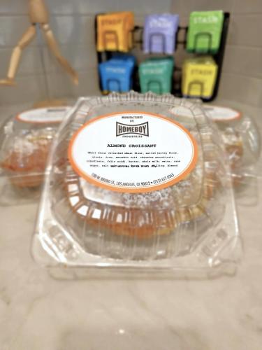 a plastic container of food sitting on a counter at The Metric - Los Angeles Downtown in Los Angeles