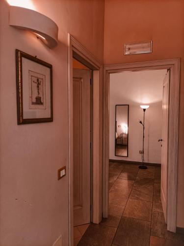 a hallway with a door leading to a room at Il Casale di David in Pontedera