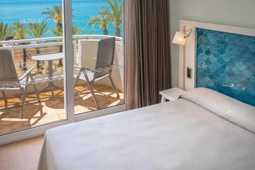 Katil atau katil-katil dalam bilik di Caprici Beach Hotel & Spa
