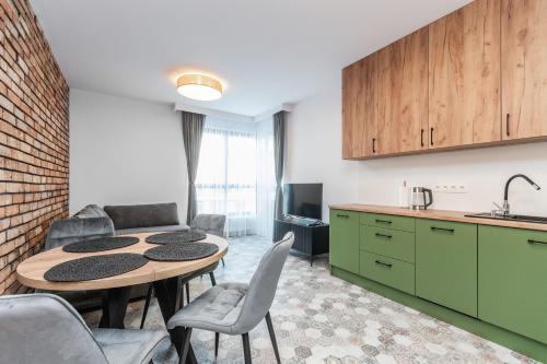 Doki Montownia - Pistacjowy by Grand Apartments