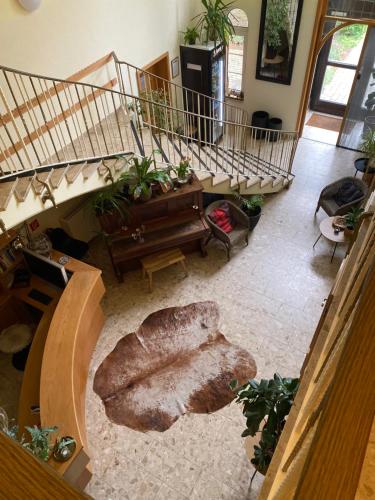 an overhead view of a living room with a large rock at Vanilla Hof in Naumburg