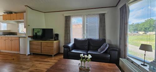 Køkken eller tekøkken på Fijne chalet aan het bos!