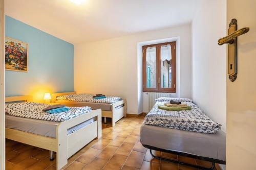 Postel nebo postele na pokoji v ubytování CASA LUISA
