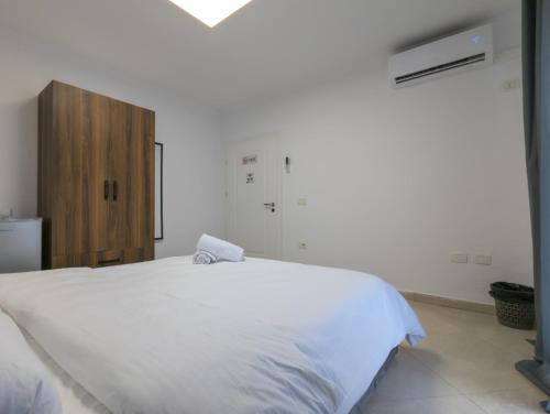 Postel nebo postele na pokoji v ubytování Center Luxury Rooms