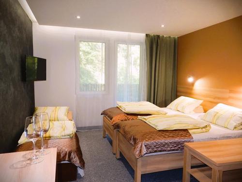 Postel nebo postele na pokoji v ubytování SEA-PORT Resort