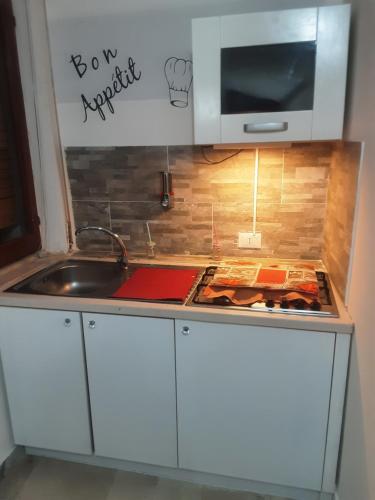 Kuchyň nebo kuchyňský kout v ubytování Affittacamere da chris