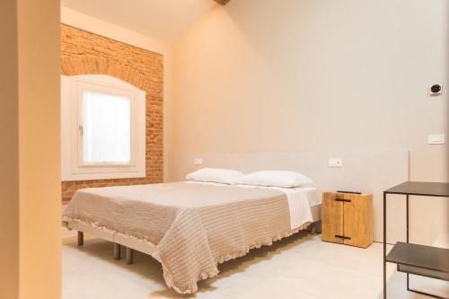 Una cama o camas en una habitación de Residenza Castei