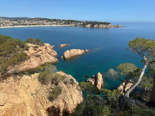 an aerial view of a large body of water at Apartaments Platja d’Aro in Platja  d'Aro