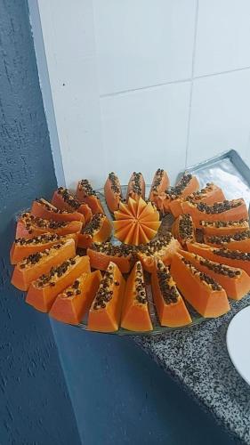 a plate of food on top of a table at Guida Residenza Pousada in Campos do Jordão