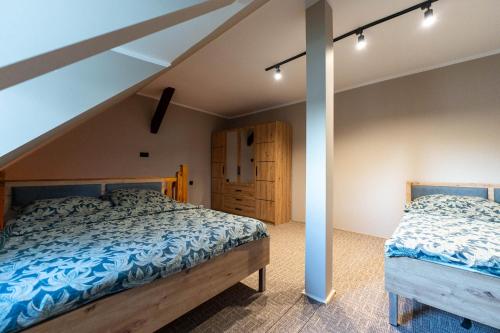 Ένα ή περισσότερα κρεβάτια σε δωμάτιο στο FULEDA Holiday Home