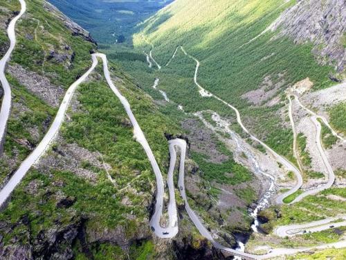 a winding road on the side of a mountain at Dalen Apartment in Stranda