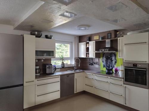 Η κουζίνα ή μικρή κουζίνα στο Whirlpool Appartement Baden-Baden, Schwarzwald