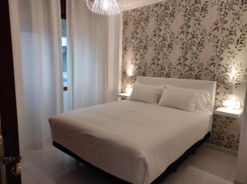 Ένα ή περισσότερα κρεβάτια σε δωμάτιο στο Apartamento 1 habitacion 450m playa Baltar-VUT